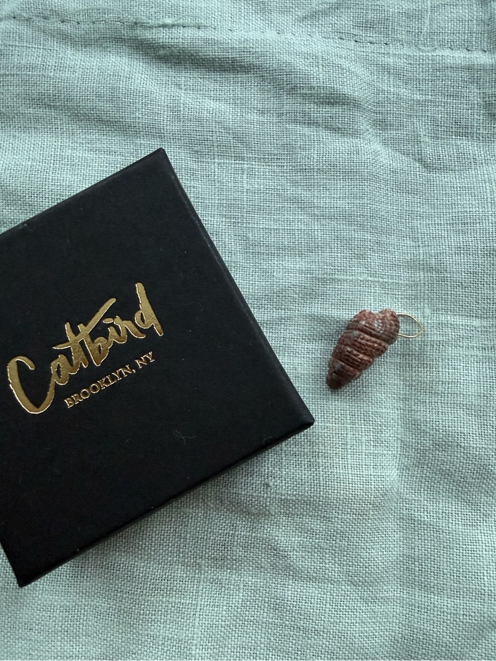 Catbird Carved Shell Charm